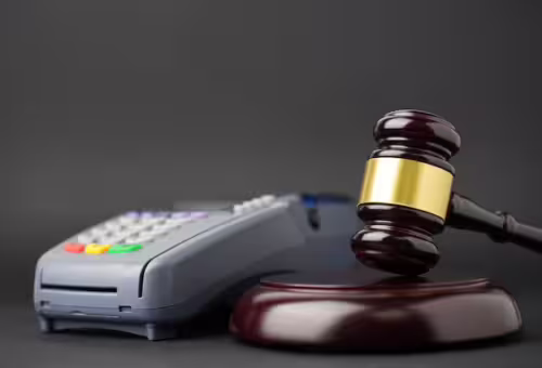 finance-banking-law-concept-payment-pos-terminal-judge-gavel-black-background-with-copy-space_208024-1841